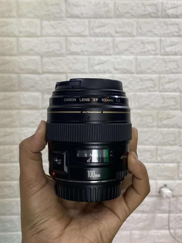 LENS CANON 100MM  USED